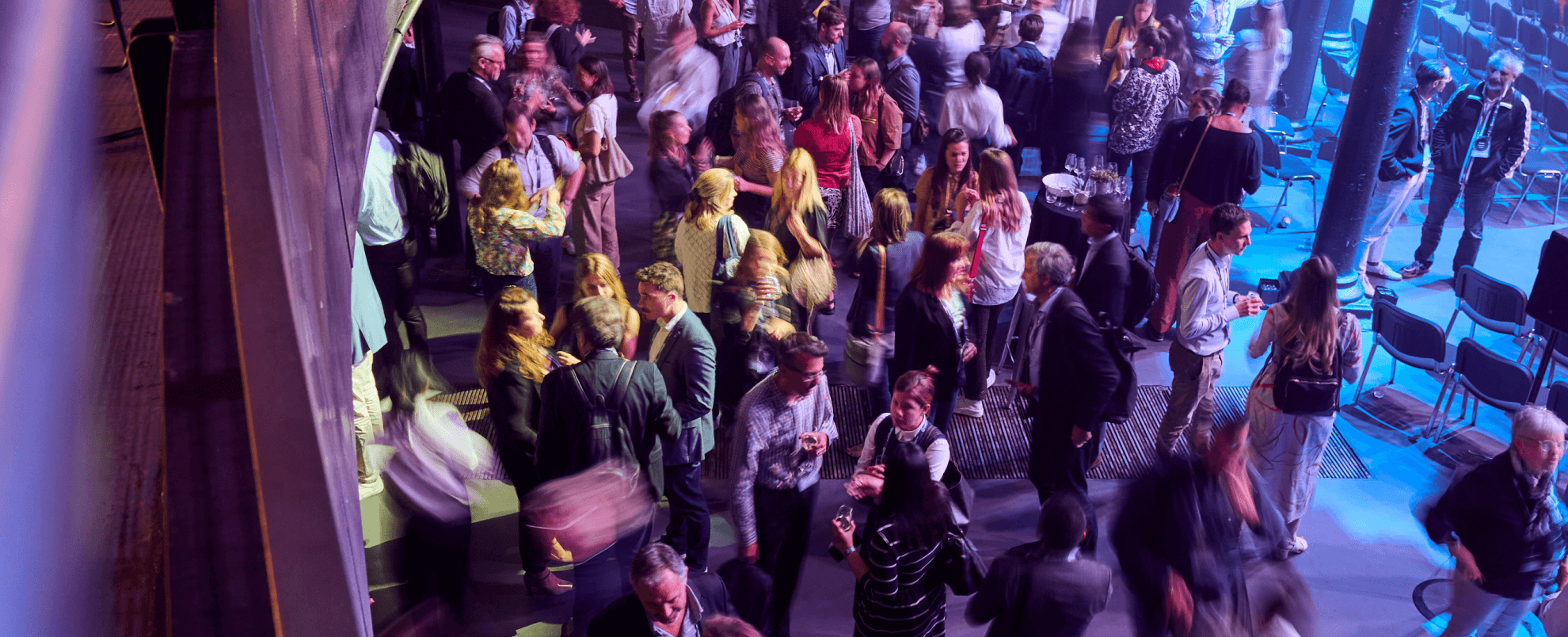People networking at an Ellen MacArthur event
