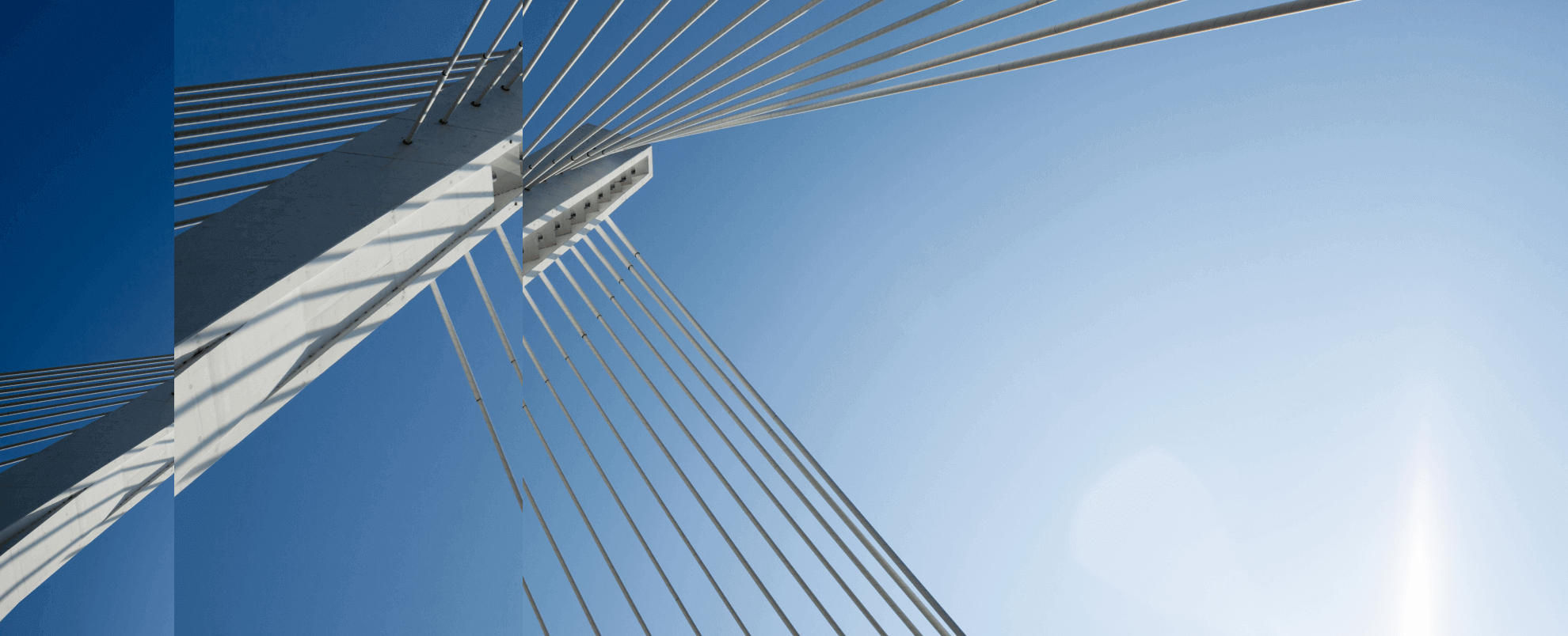 Looking up at the top of a bridge