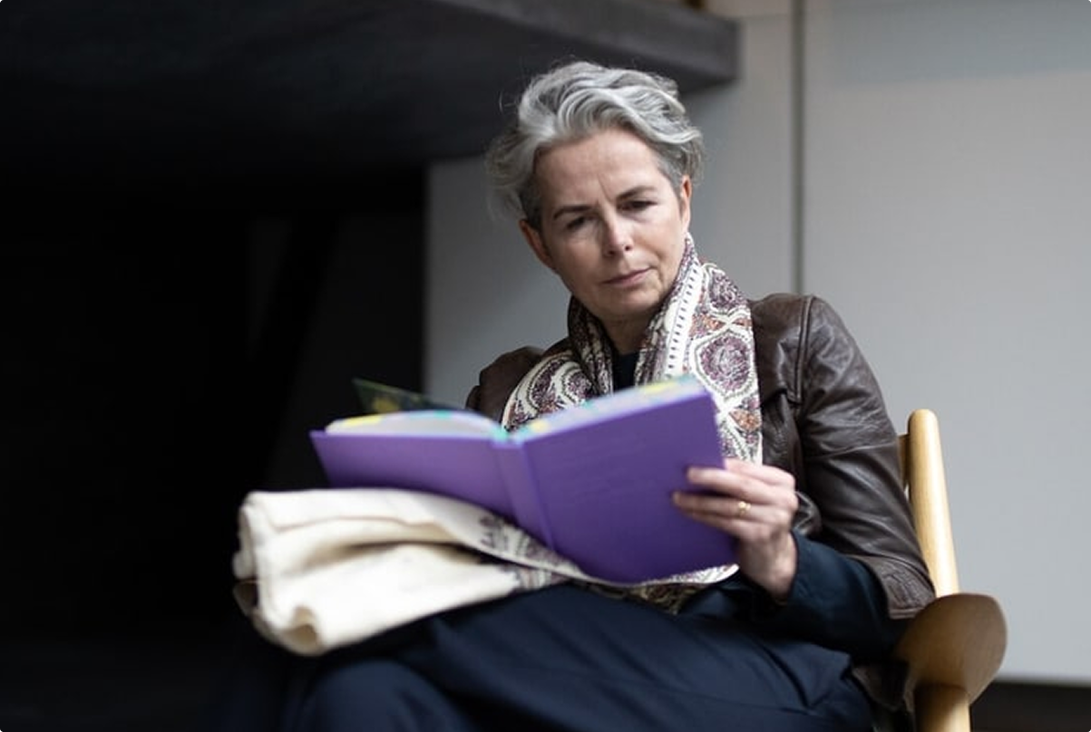 Woman reading the fashion book