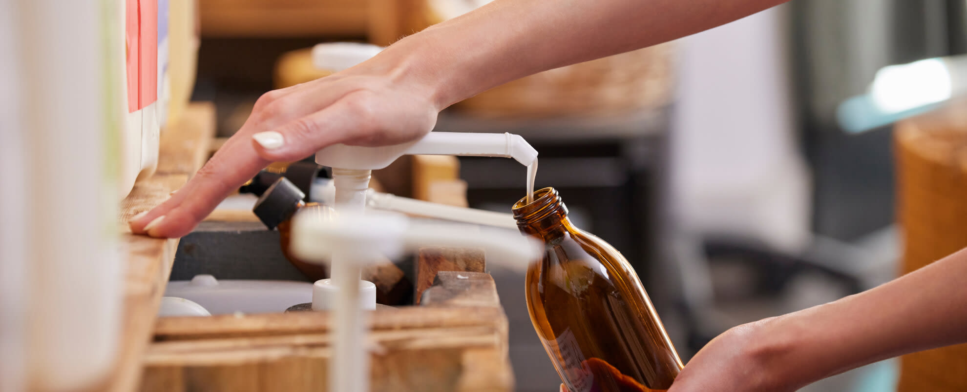 Picture of a person refilling a bottle