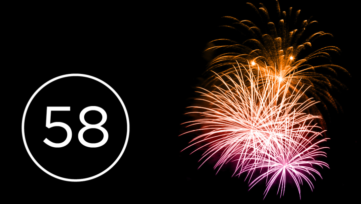 Fireworks on black background, with number '58' in bottom left 