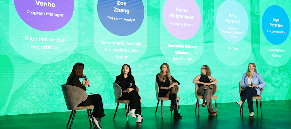 People on a stage discussing a topic