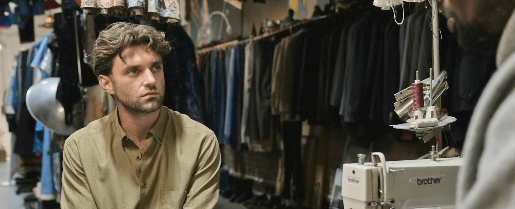 Person being educated in a clothing workshop