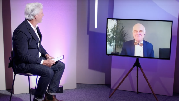 show host talking to guest