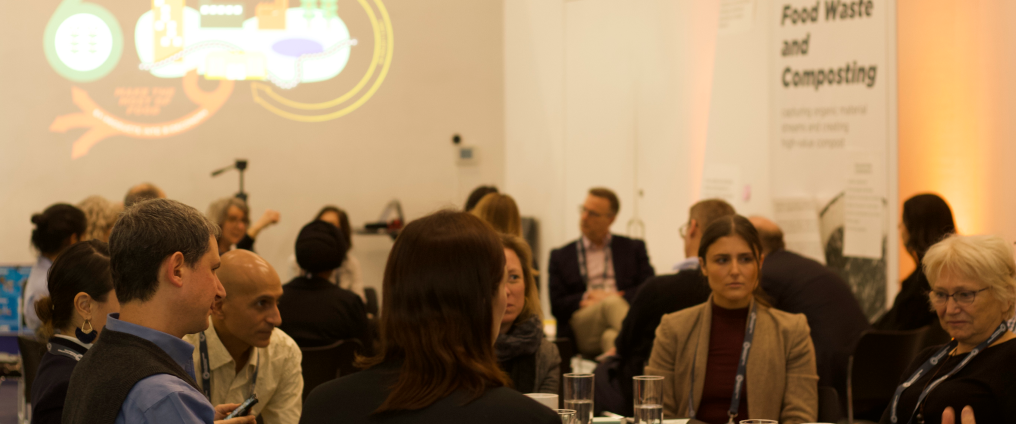 people sat at table during an event