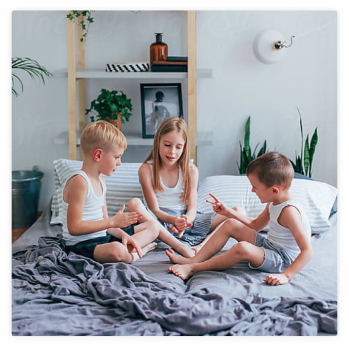 childrens on bed