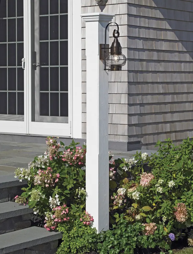The 5 1/2" sq. post with 1/2" eased edges and Westport cap make the Norfolk a knockout. Pre-finished white in Solid Cellular Vinyl. Pictured with the American Onion Side Mount lantern (sold separately).