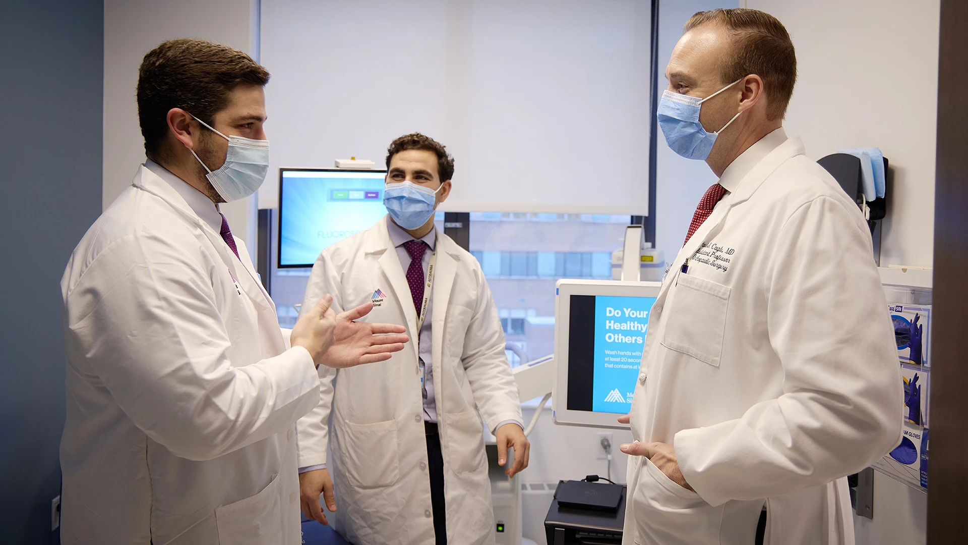 Dr. Cagle and two residents at the newly launched C.V. Starr Hand Center