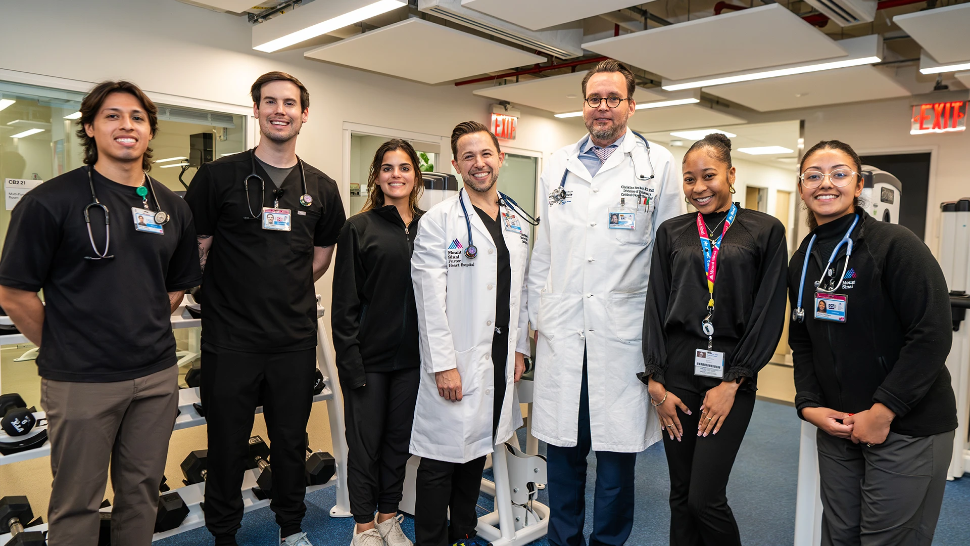 From left: Adrian Andino, Exercise Physiologist; Kevin Riggins, Exercise Physiologist; Abby Pasquale, Senior Exercise Physiologist; Craig Feinman, DPT, Board Certified Pulmonary Physical Therapist and Director of Clinical Operations; Dr. Becker; Destinee Howai-Cameron, Care Coordination Associate; Ms. Pacheco