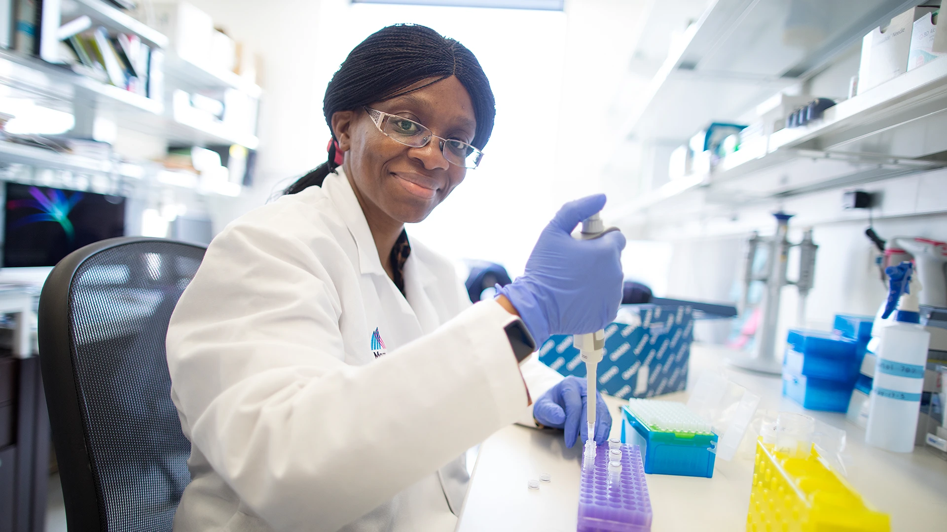 Stephanie Tankou, MD, PhD, in her lab, which focuses on the microbiome and regulation of inflammation in the central nervous system



