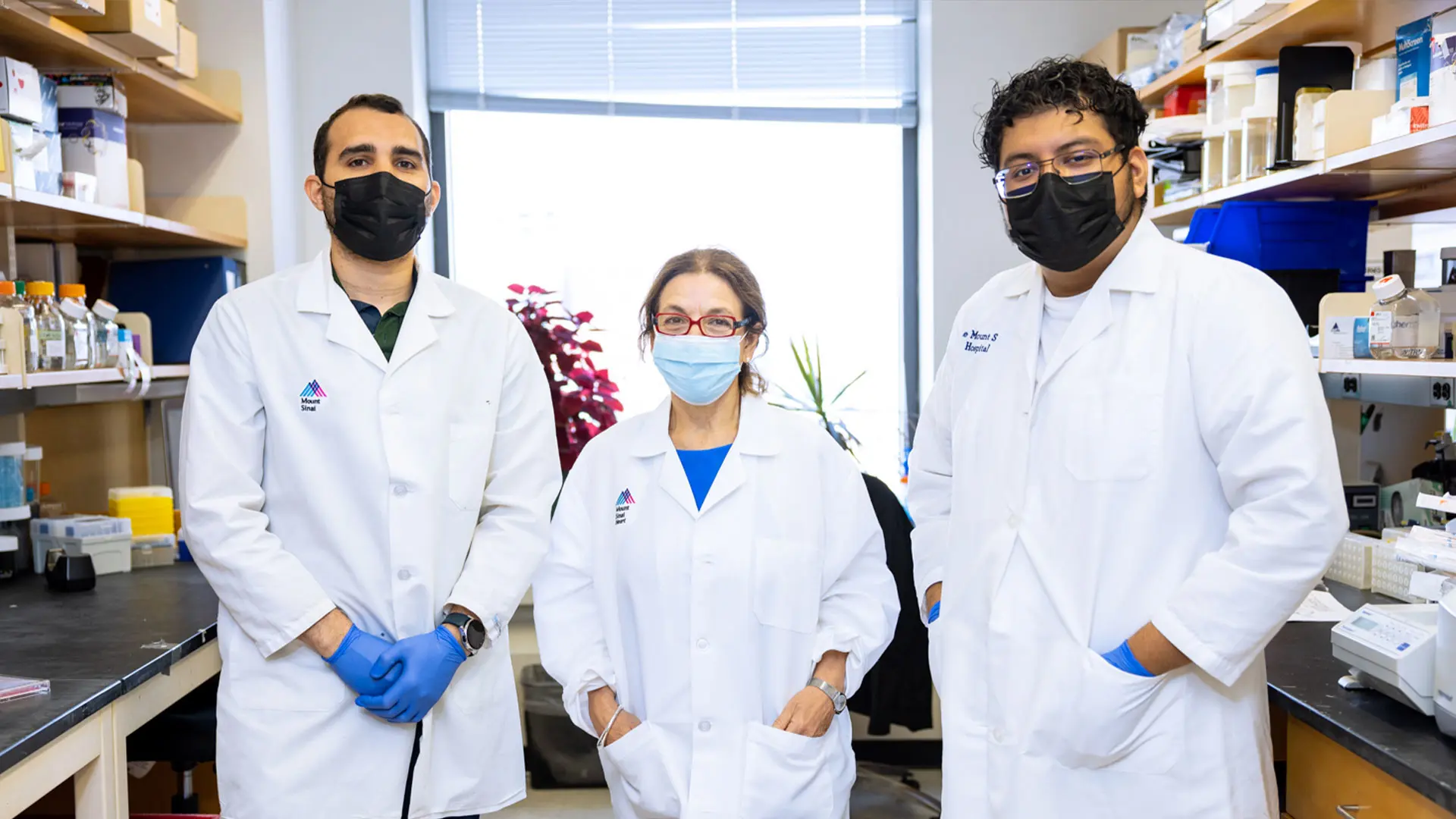 Student Kevin Medina, right, in the lab with Maria Curotto de Lafaille, PhD, and Weslley Fernandes Braga, PhD