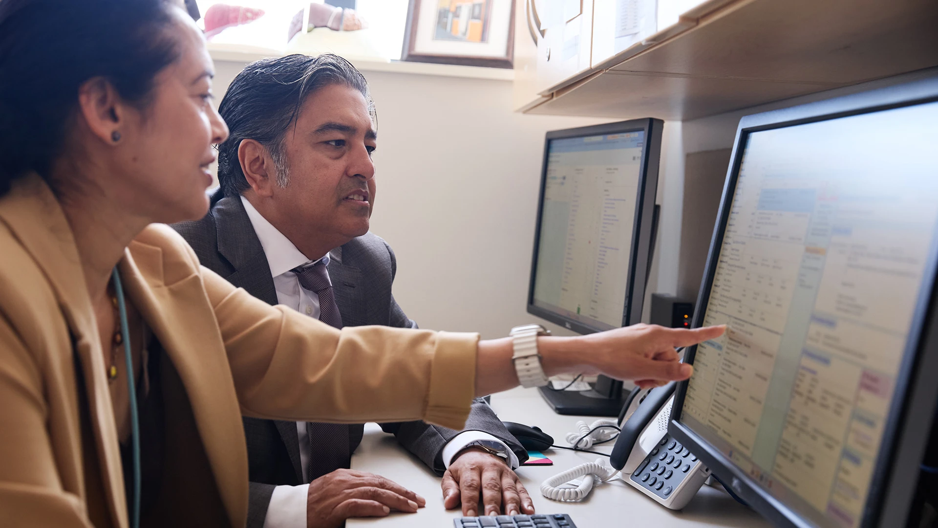 Dr. Rahim, right, is using Mount Sinai's robust population health EMR infrastructure to review the Center’s liver screening opportunity for Mount Sinai patients with type 2 diabetes.