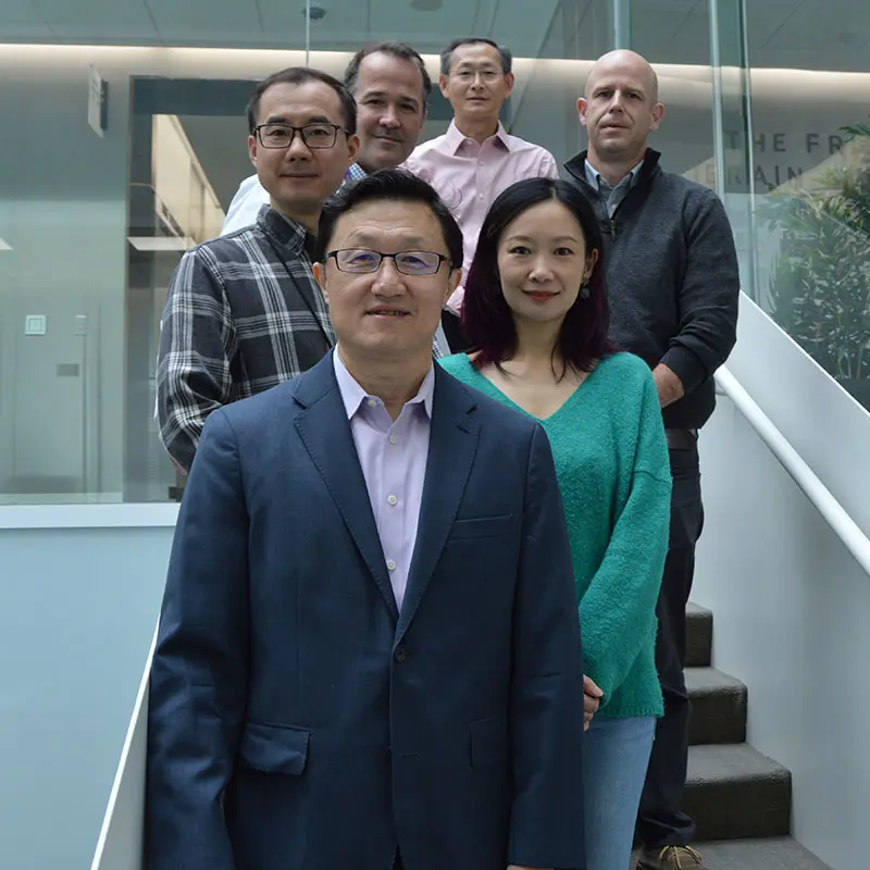 Zhenyu Yue, PhD, front center, with, clockwise, Zhuhao Wu, PhD; John F. Crary, MD, PhD; Bin Zhang, PhD; Joel Blanchard, PhD; and Nan Yang, PhD 