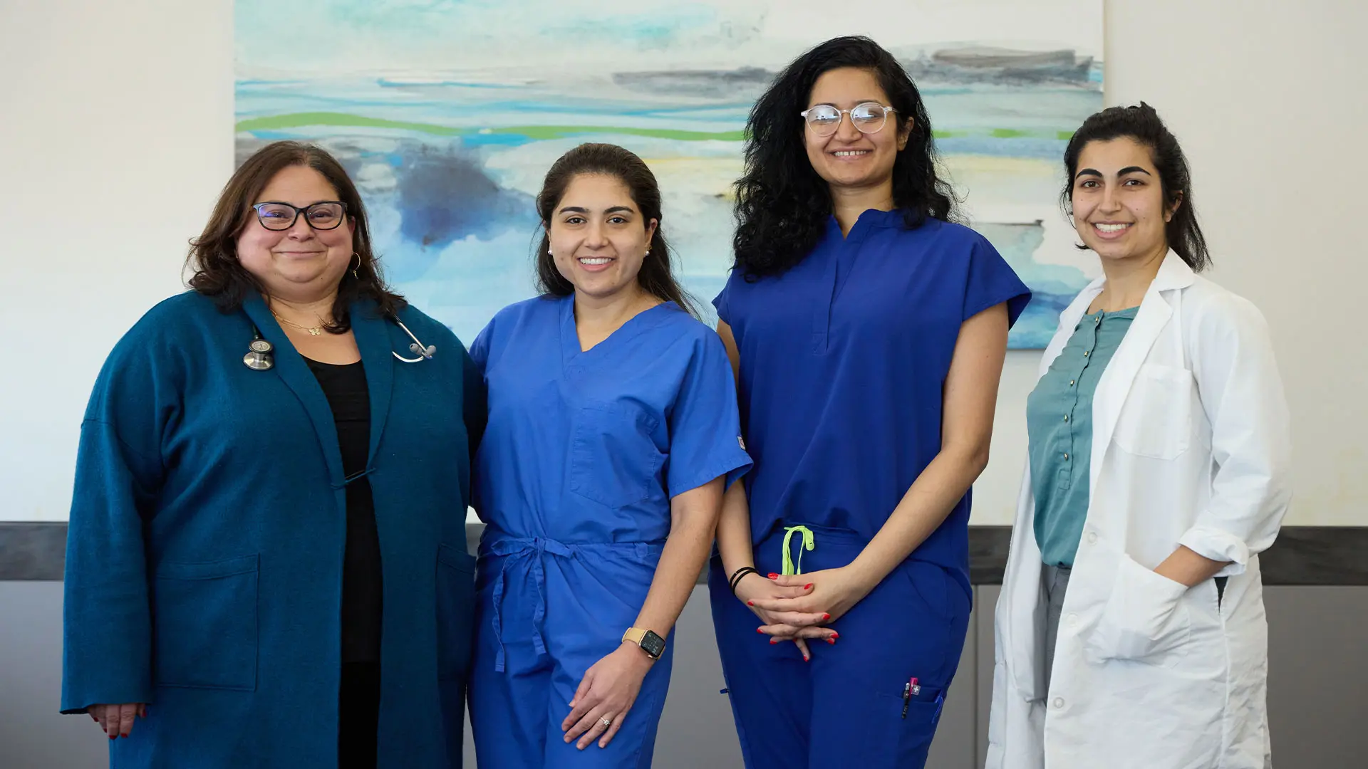Helen M. Fernandez, MD, Vice Chair of Education and Professor of Geriatrics, with geriatrics and palliative medicine trainees