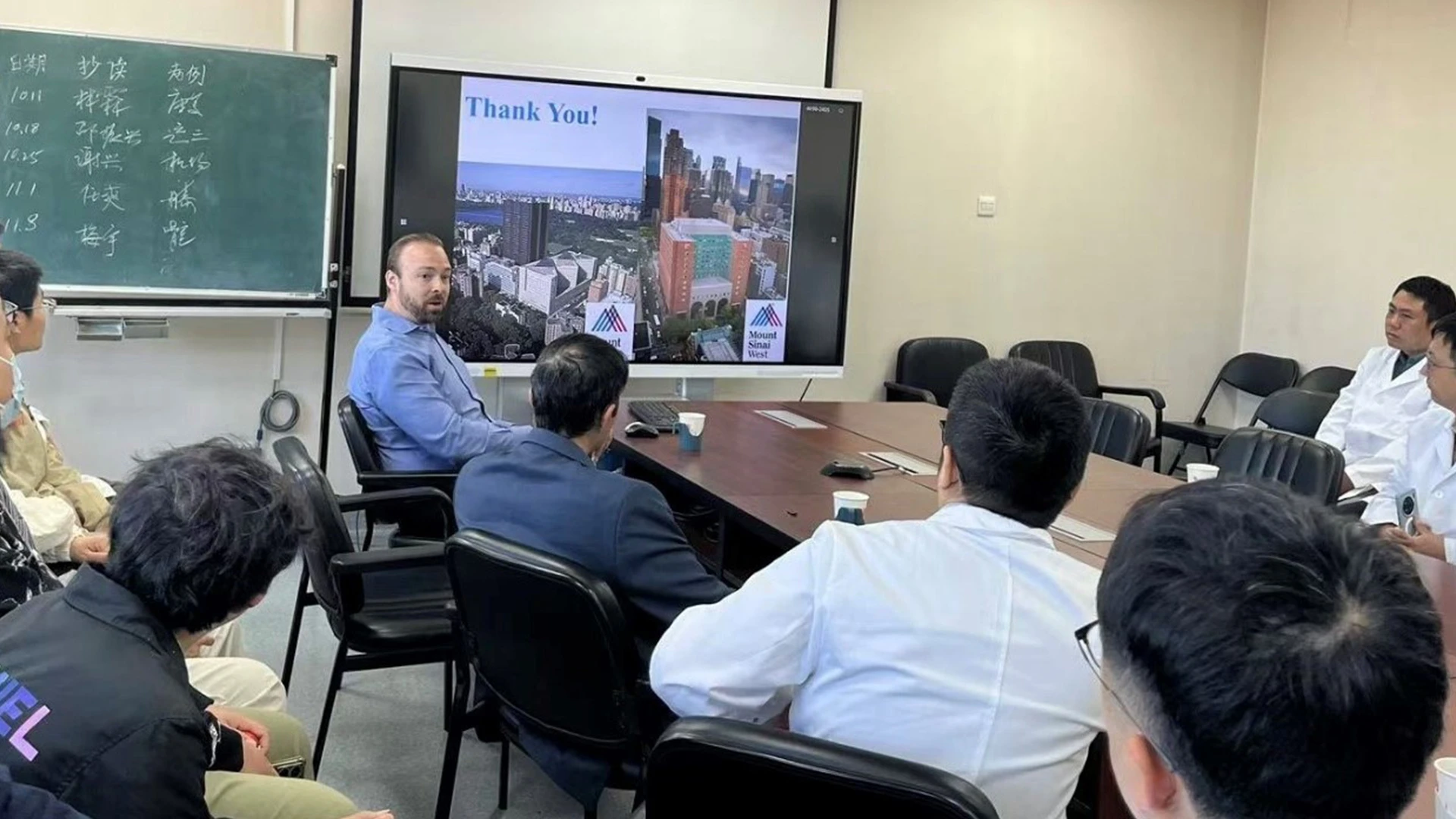 Dr. Cagle finishes a lecture in the Department of Orthopaedic Surgery at Peking University Third Hospital in Beijing.