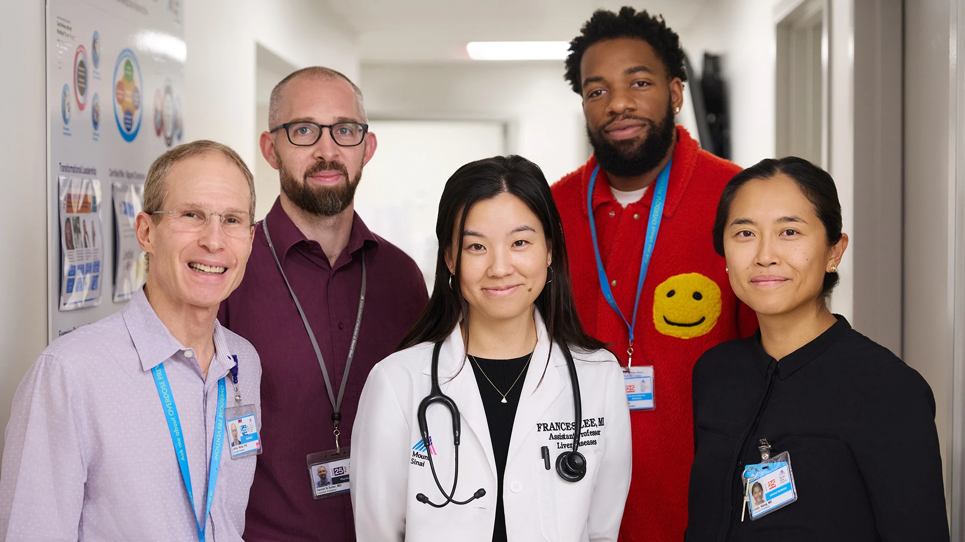 The REACH team includes, from left, Director Jeffrey Weiss, PhD, a psychologist; psychiatrist Daniel Suter, MD; Dr. Lee; patient navigator Uchenna Ijomah; and Linda Wang, MD, a primary care physician and addiction specialist.