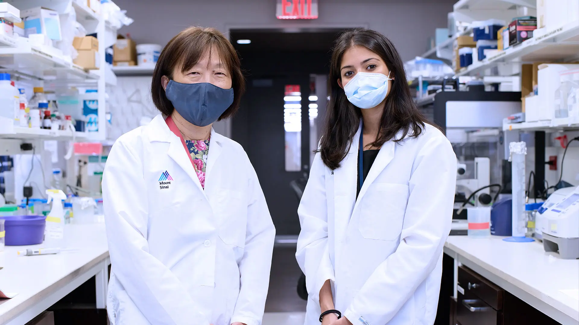 Judy H. Cho, MD, left, with Shikha Nayar, PhD, who received her degree in 2021