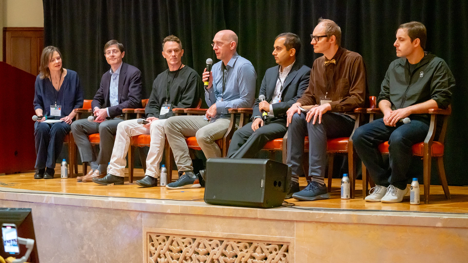 World Leaders from top neurotech startups discuss industry challenges. From left: moderator Sarah McBride (Bloomberg); Benjamin Rapoport, MD, PhD (Precision Neuroscience); Tom Oxley, MD, PhD (Synchron); Florian Solzbacher (Blackrock); Vikash Gilja (Paradromics); Patrick Kaifosh (CTRL Labs/Meta); and Max Hodak (Science).