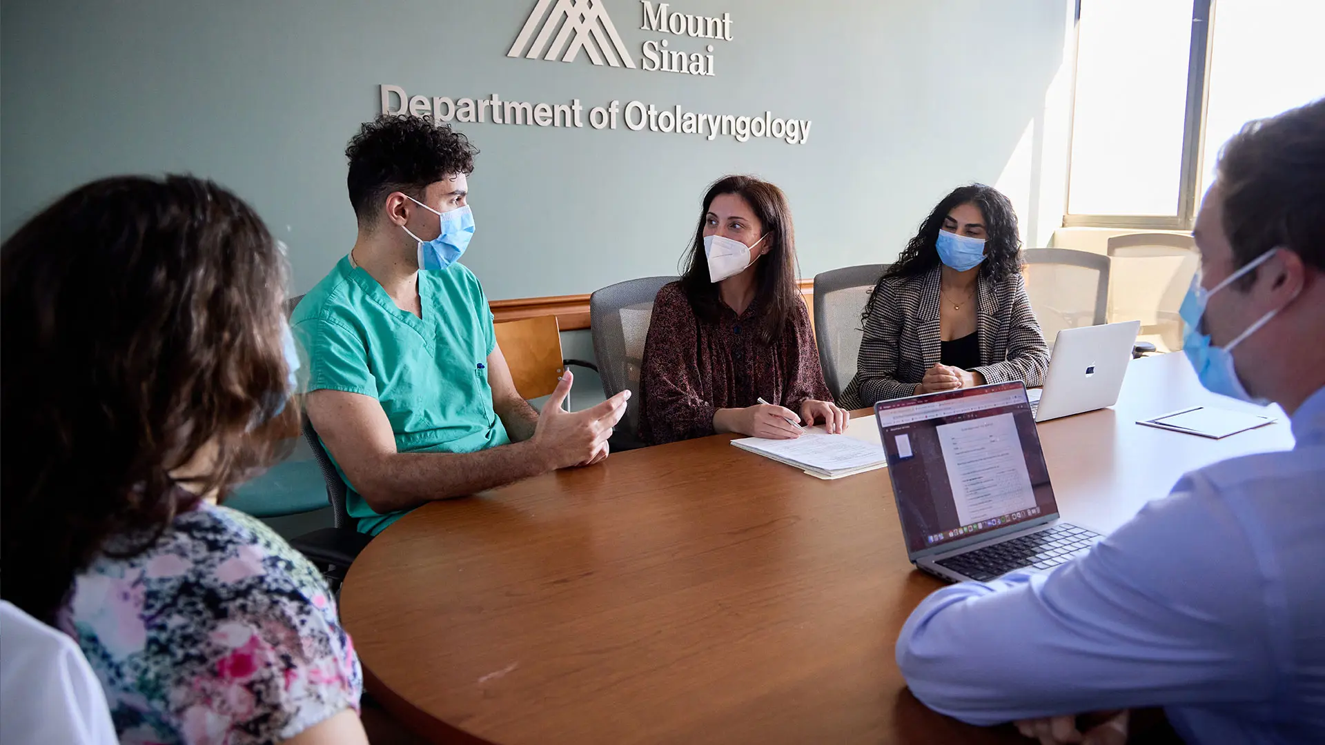 Dr. Kirke (center) with research fellows.