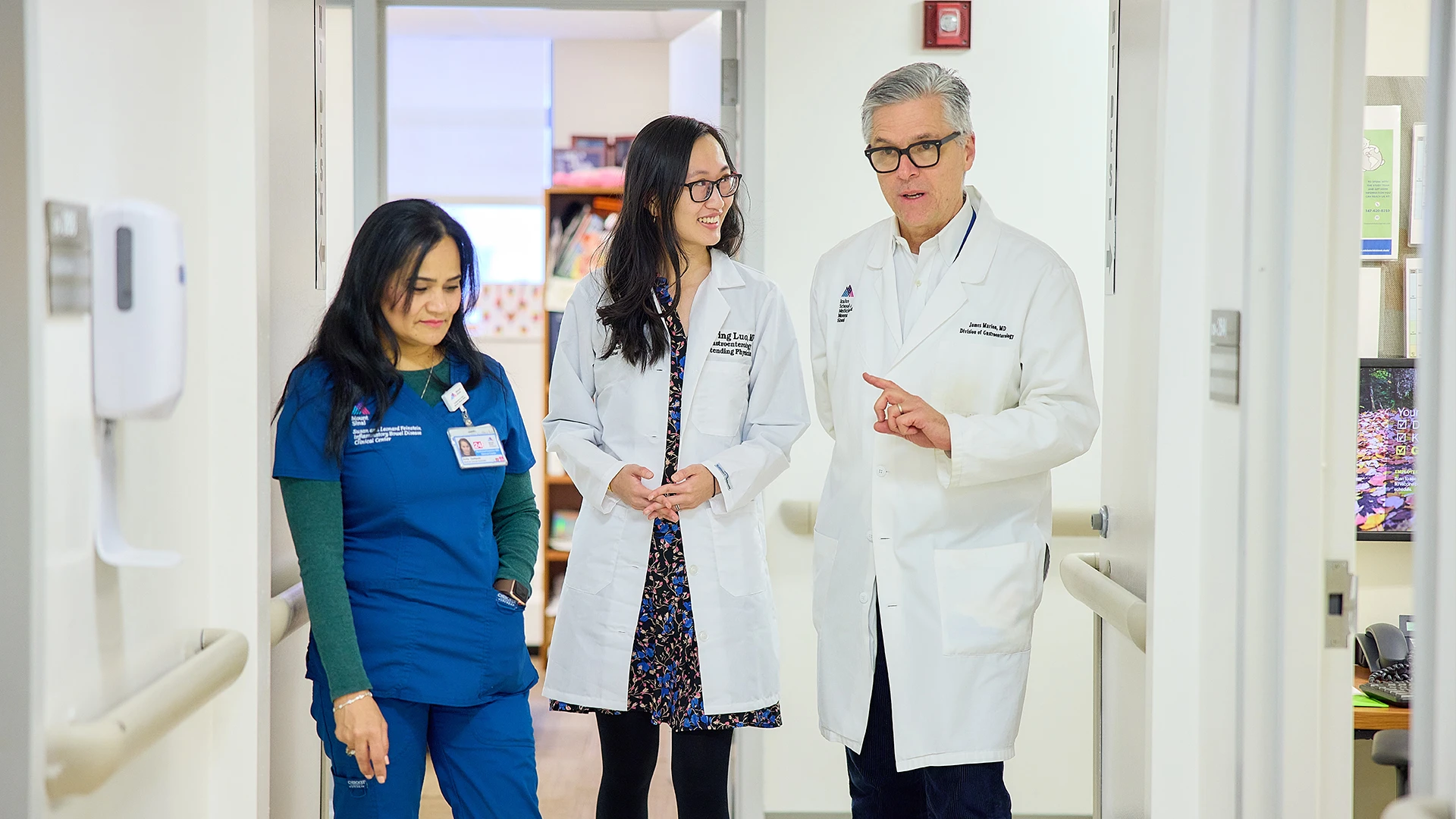 Yuying Luo, MD, center, discusses a DGBI case with medical assistant Anita Gadtaula and James F. Marion, MD, a Mount Sinai gastroenterologist.