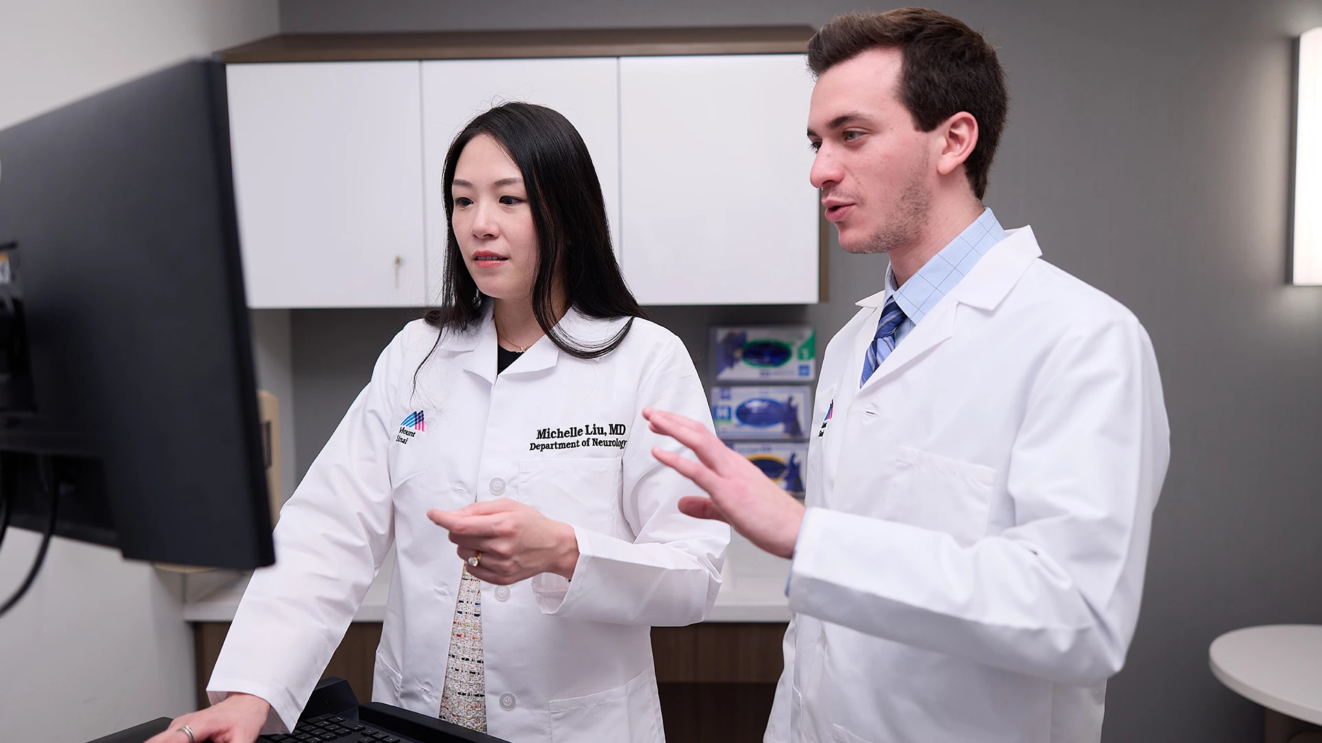 Michelle Liu, MD, with Aaron Burshtein, MD