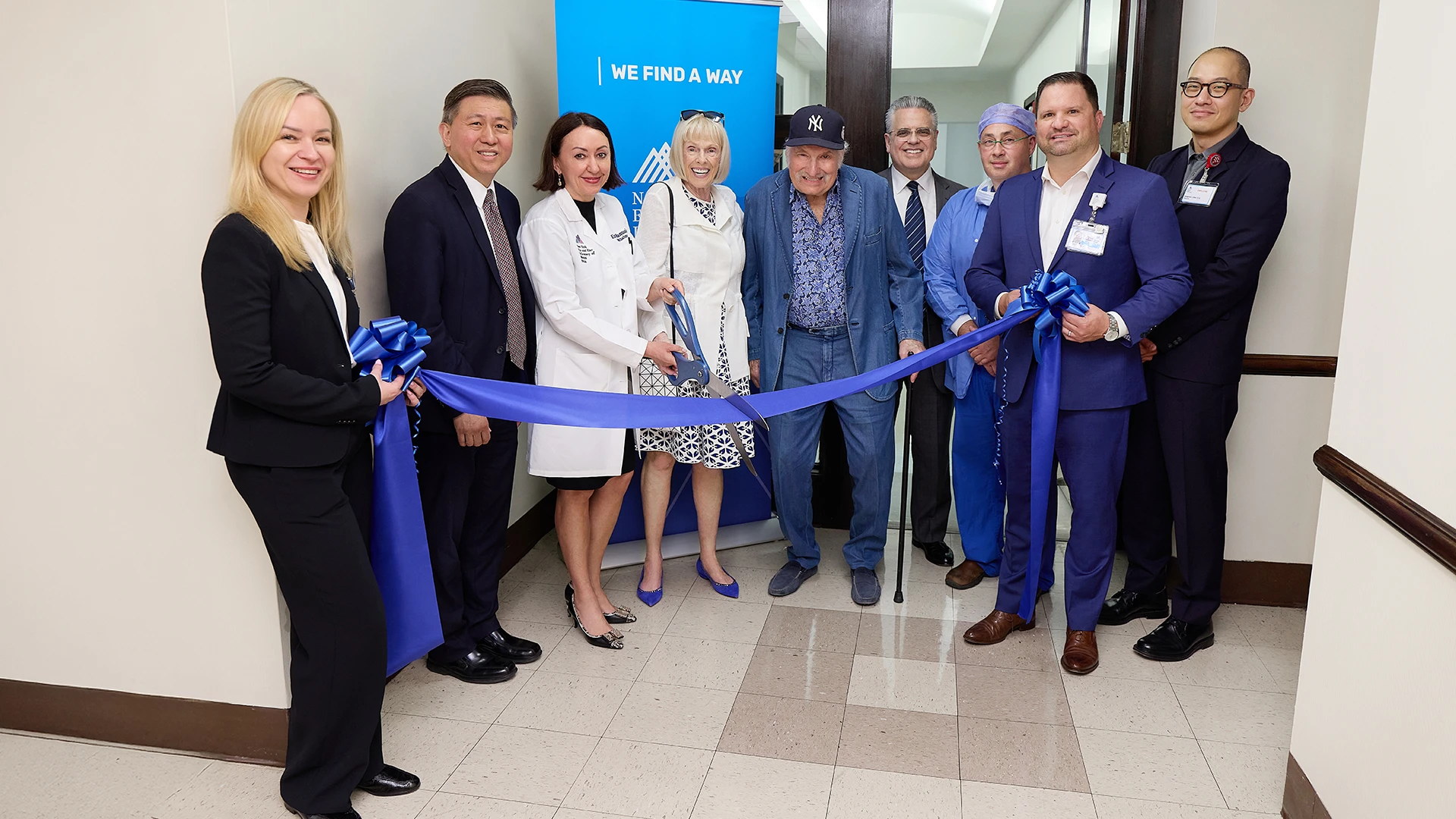 Ribbon-cutting ceremony held on June 4, 2025, to celebrate the opening of the Center for Refractive Solutions. From left: Anna Guller; James C. Tsai, MD; Kira Manusis, MD; Toni and Martin T. Sosnoff; Paul A. Sidoti, MD; Gennady Landa, MD; Salvatore Loiacono; and Sangyoon Jason Shin, DO