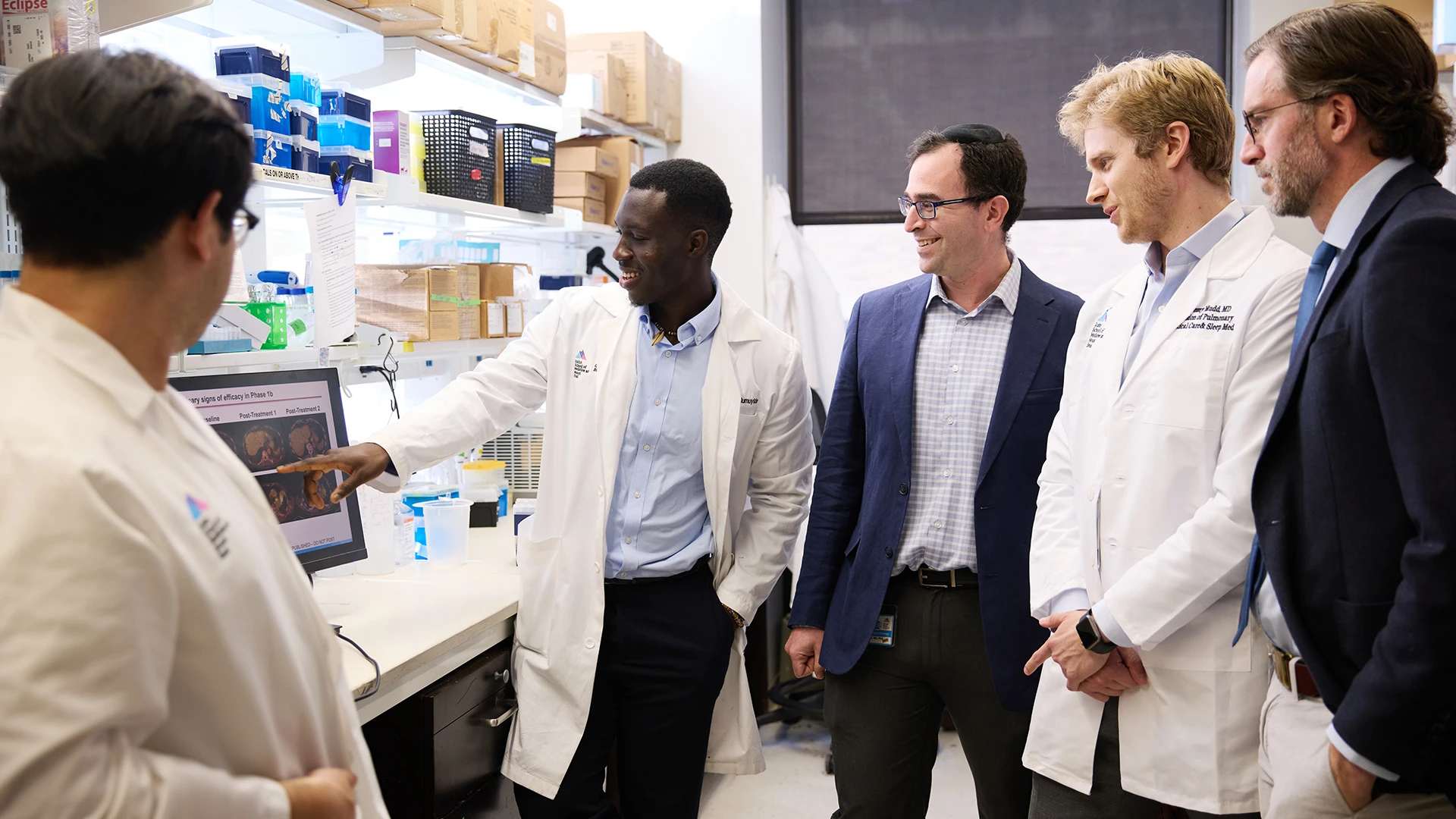 A Mount Sinai research team is testing whether treatment with dupilumab to block IL-4 signaling can reduce the risk of developing lung cancer among patients with eosinophilic chronic obstructive pulmonary disease in addition to improving their respiratory symptoms. The team includes, from left, MD-PhD students Matthew Park and Ezekiel Olumuyide; Robert Samstein, MD, PhD; Dr. Mudd; and Dr. Marron. 