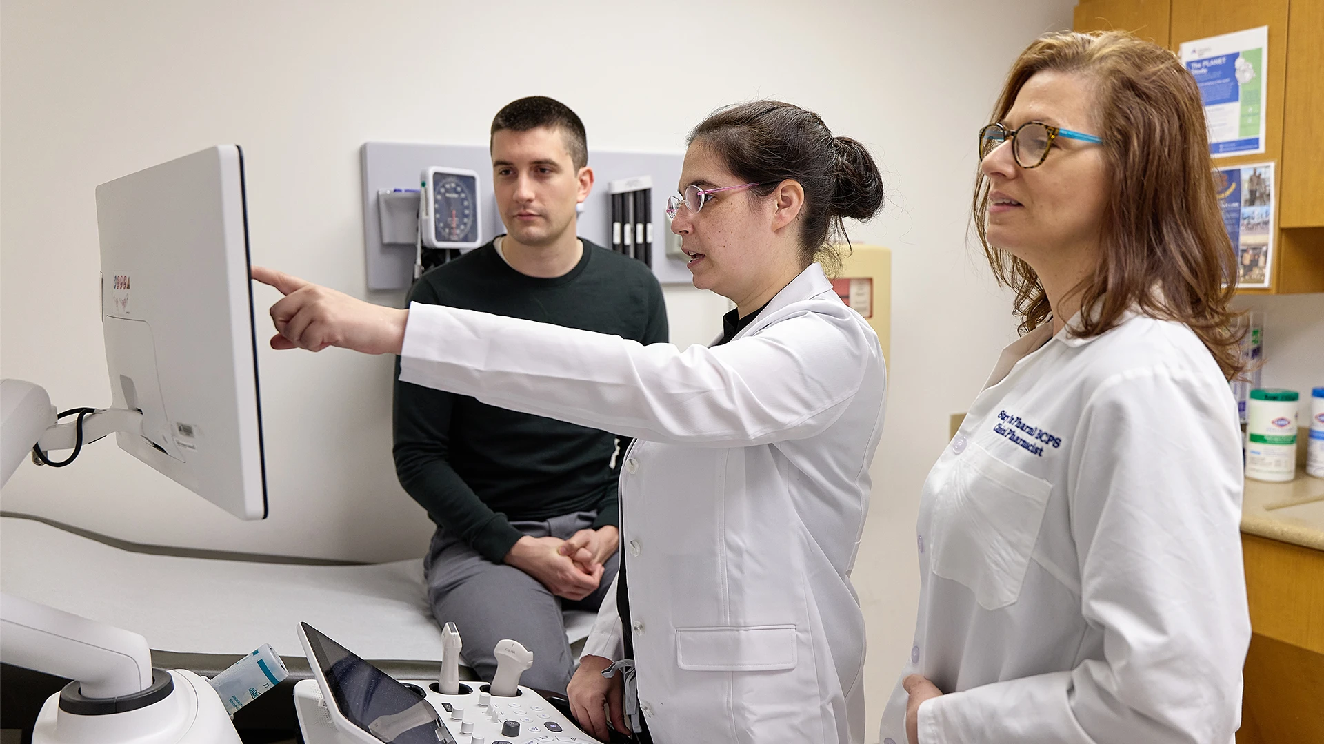 Stephanie Gold, MD, center, and Laura Manning, RD, right, help IBD patients develop diet plans to ensure proper nourishment.