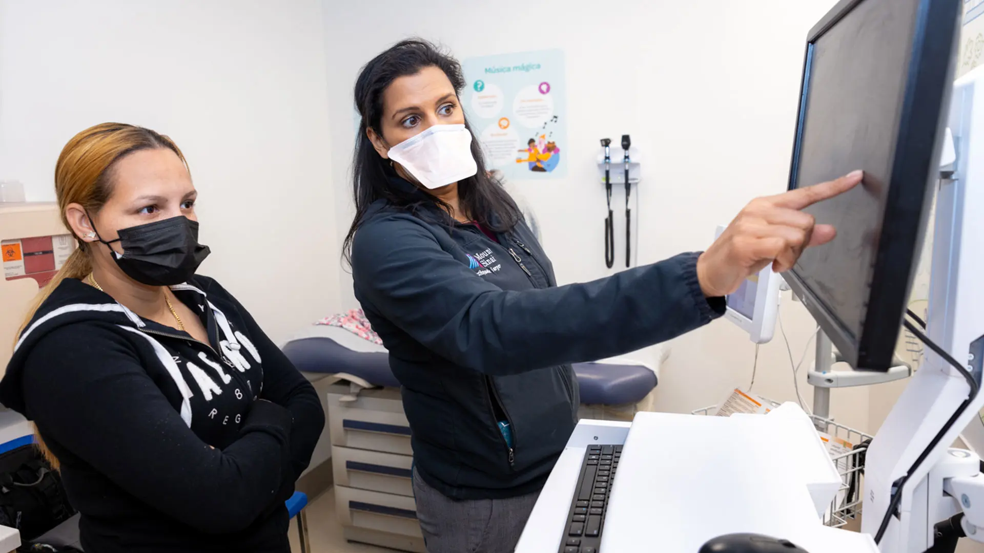 Following evaluation, Dr. Ranade discusses operative intervention with Estaphany Pichardo, mother of Aaliyah Santana.
