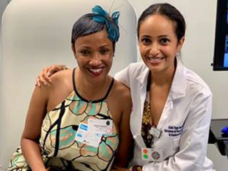 Aida Taye, MD, with patient Thamar in a follow-up visit 14 days after a 4.5 cm benign nodule was removed in a TOETVA procedure performed by Dr. Taye and Gustavo Fernandez-Ranvier, MD, PhD. 
