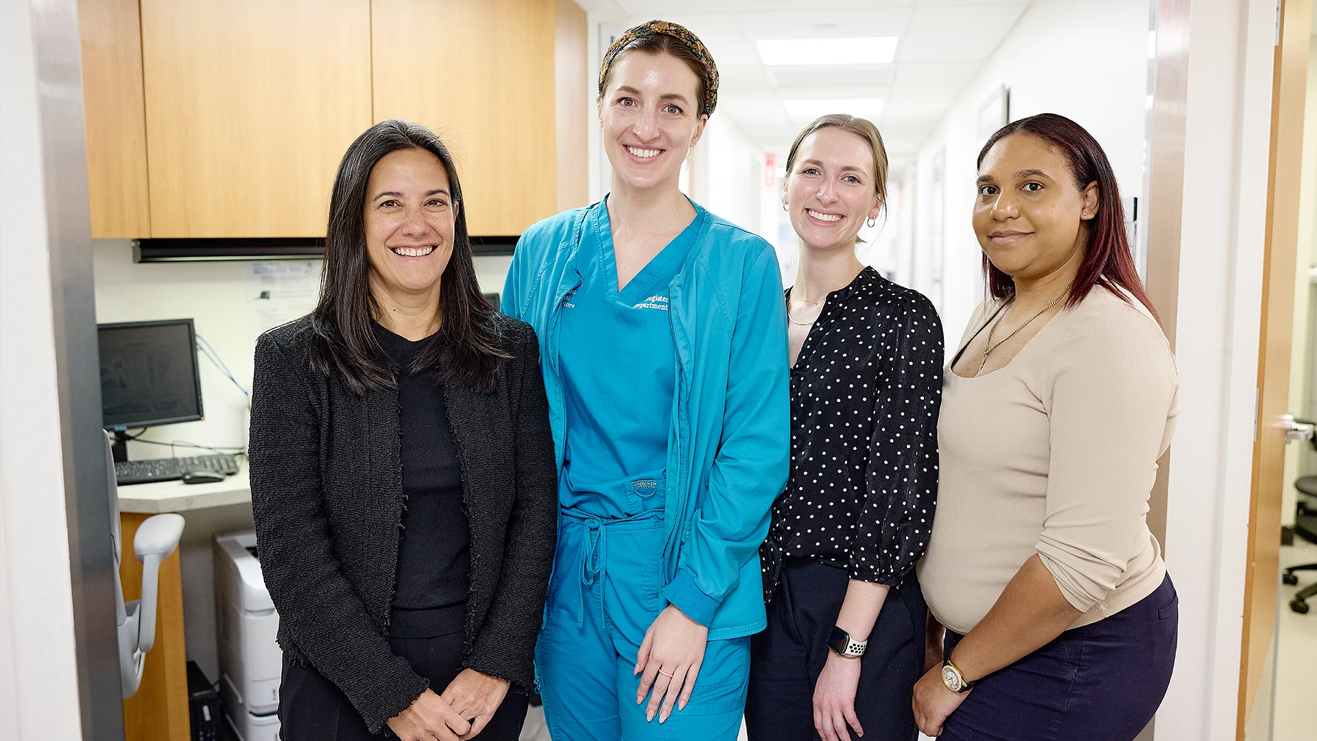 Aimee Lucas, MD, left, leads a surveillance team for people at high risk for pancreatic cancer. The team also includes, from left, Rachel Estime, BSN, RN; Miranda Veeser, DNP, FNP-C; and Karen Vazquez, Endoscopy Scheduling.
