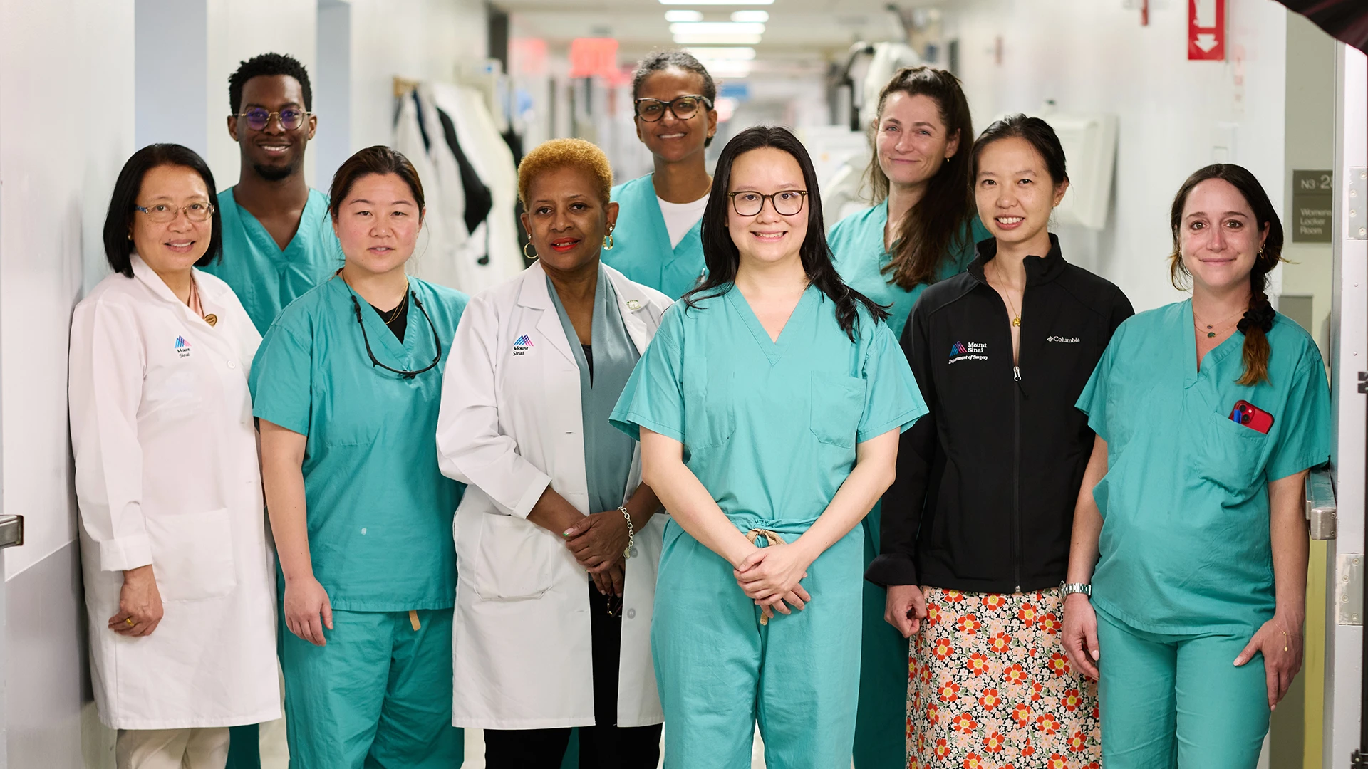 Dr. Sylla and her team are setting a new standard for same-day discharge programs for colectomy patients. From left, Divina Alorro, MSN, RN; Rashid Logan, MD (surgery resident); Sue Hahn, MD (colorectal surgery attending); nurse manager Janet Thompson, BSN, RN; Dr. Sylla; Rossana Cheng He, MD (surgery resident); Laura Caplan, PA (colorectal surgery); Tianyi Lu, MD (colorectal surgery attending); Erica Fagelman, MD (anesthesia attending).