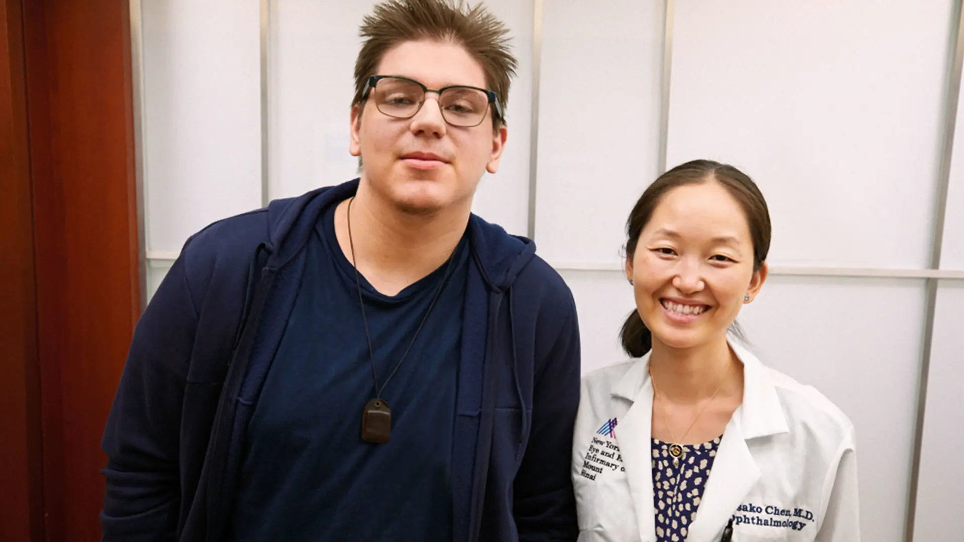 Amer and Dr. Chen during a follow-up visit