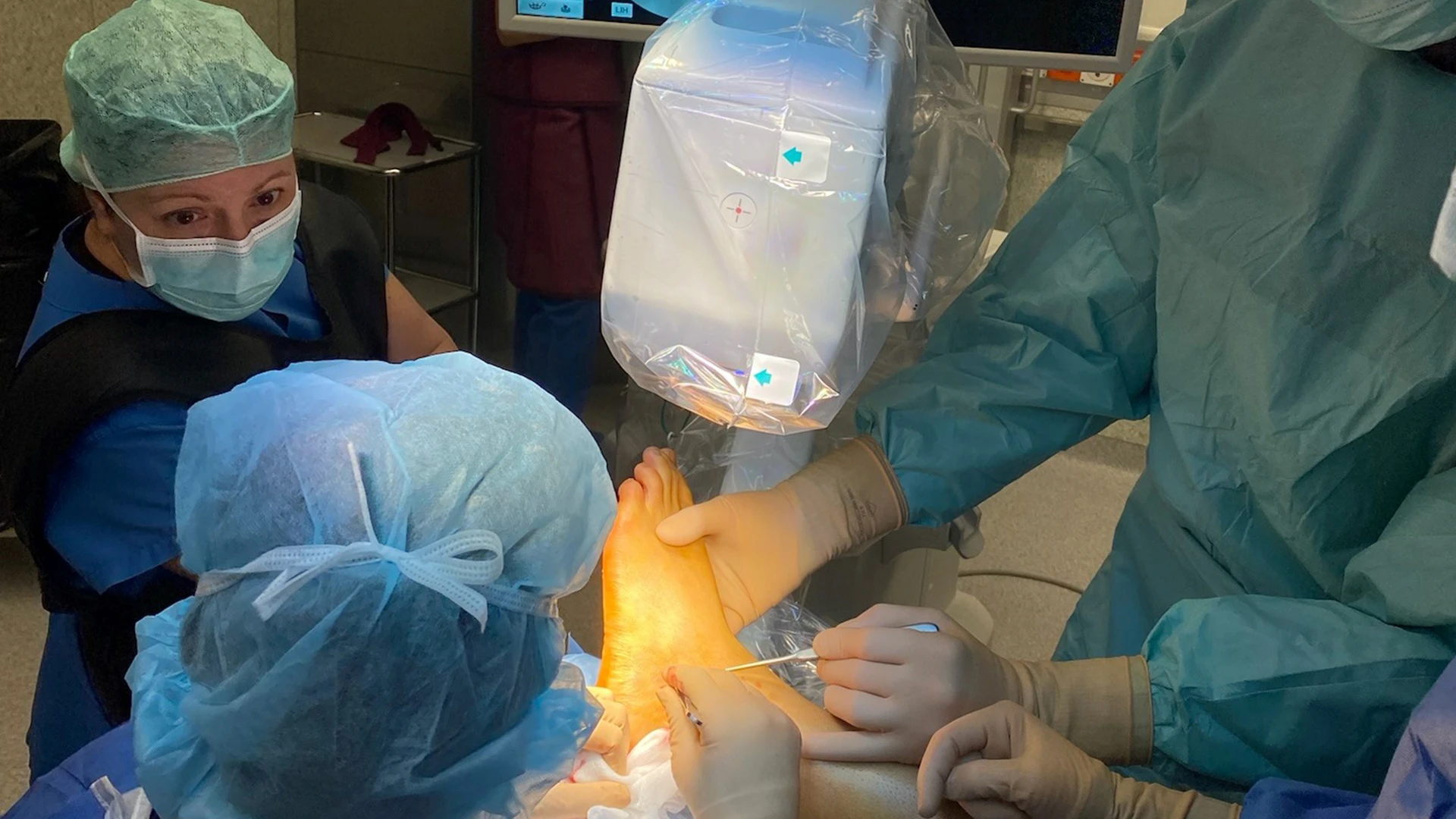 Dr. Kelly (far left) with fellow surgeons performing removal of hardware surgery in Liestal, Switzerland.