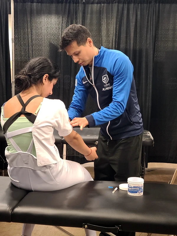 The Sports Medicine program has partnerships with a broad range of organizations, because it is important for fellows to experience a wide range of modalities. Dr. Schowalter, seen treating a USA Fencing athlete, has also worked with middle school athletes and Paralympians.