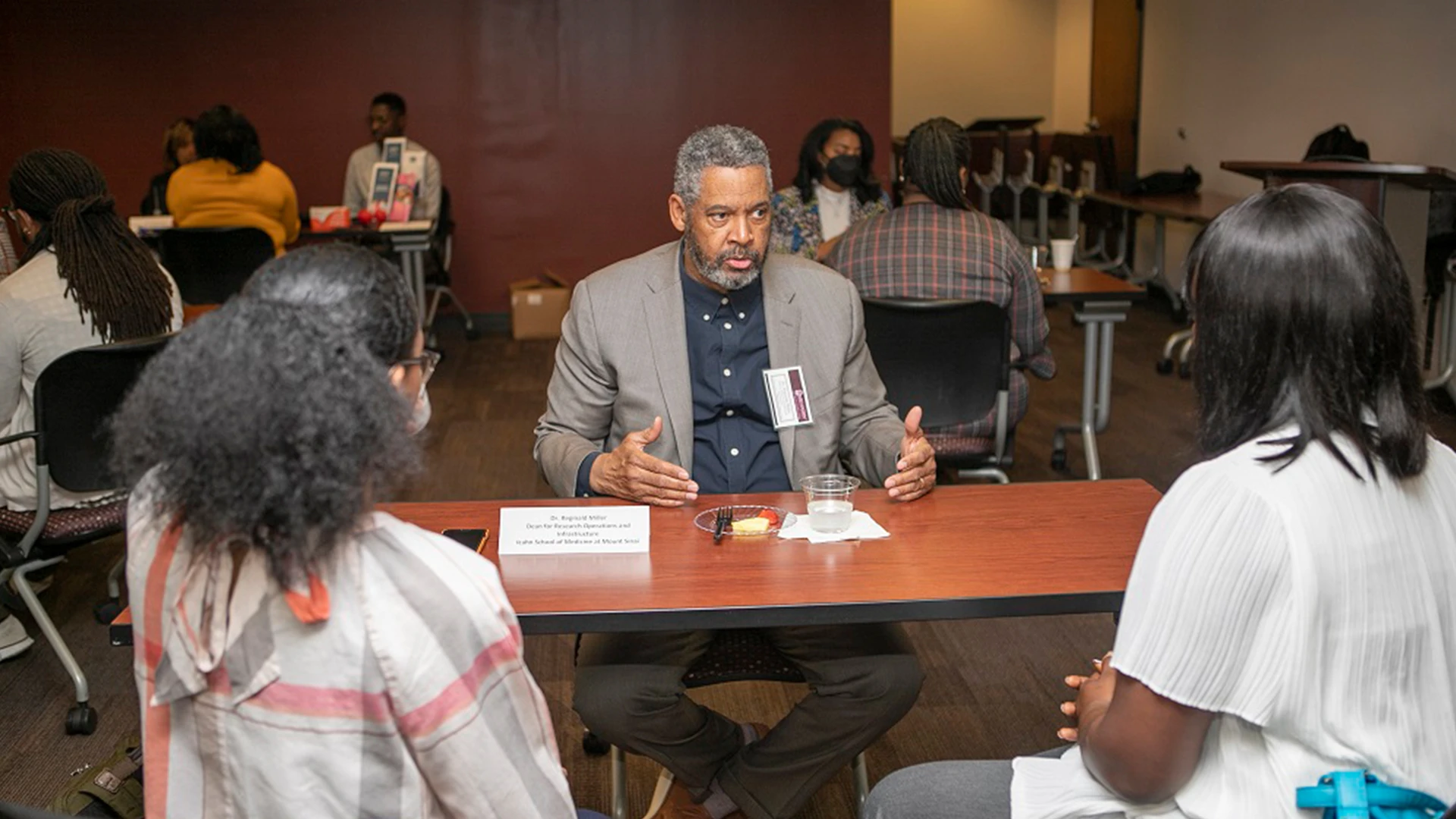Mount Sinai’s Reginald W. Miller, DVM, DACLAM, interacts with students on the campus of Meharry Medical College.