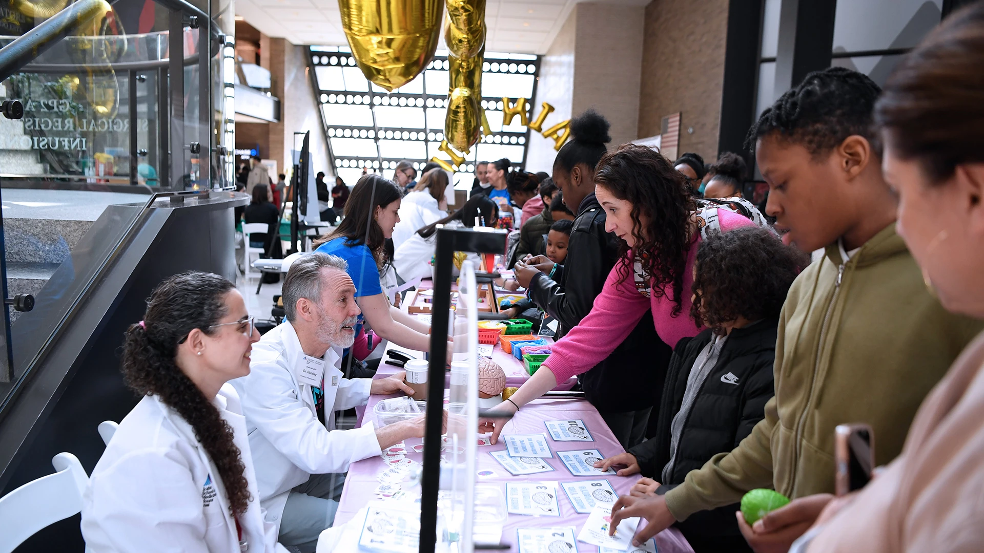 At the Meet the Experts booth, visitors to the Brain Fair could ask faculty members challenging questions about the brain. Faculty volunteers included Hala Harony-Nicolas, PhD, Associate Professor of Neuroscience, and Psychiatry, and George Huntley, PhD, Professor of Neuroscience.
