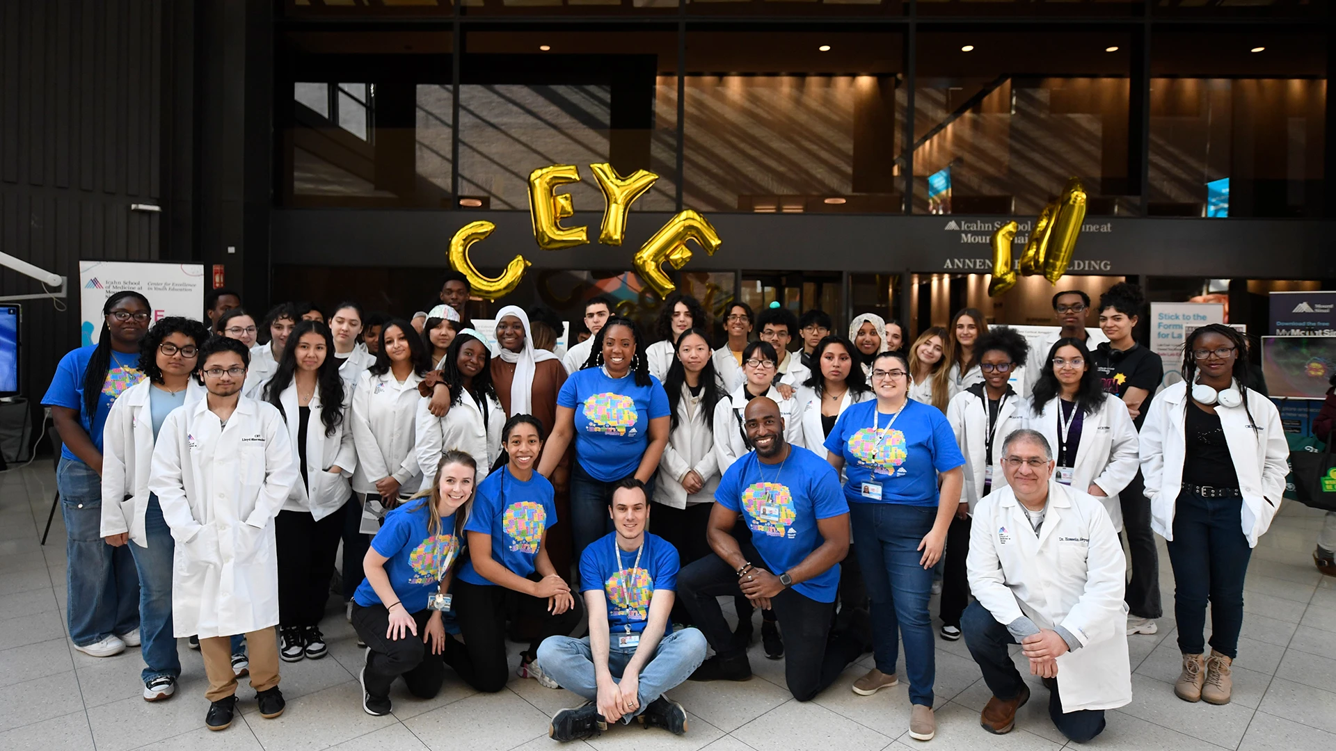 The CEYE team at the Brain Fair with high school students enrolled in the Biomedical Science Enrichment Program and The Lloyd Sherman Scholars Program. 