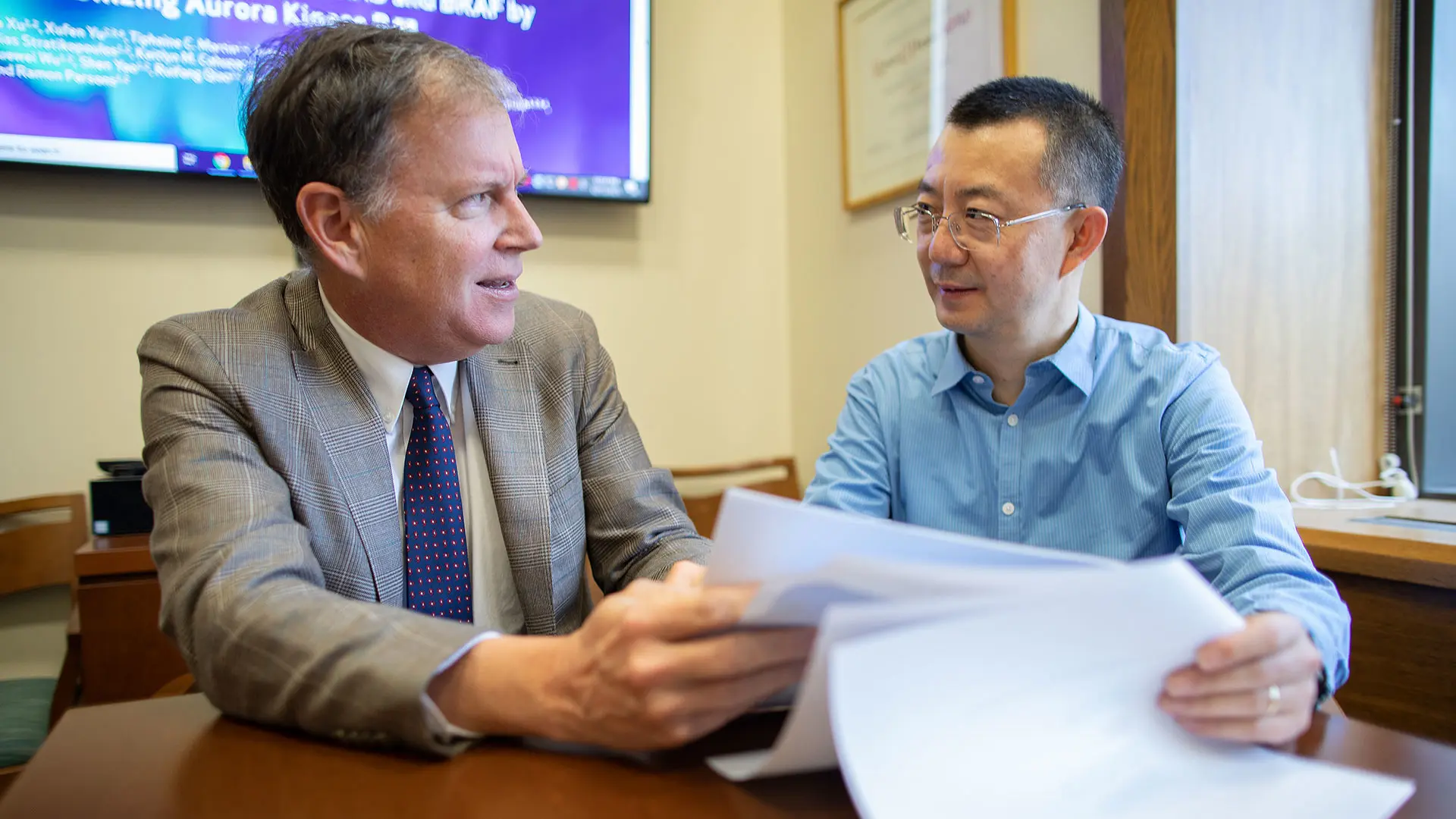 Ramon Parsons, MD, PhD, Director of The Tisch Cancer Institute, left, and Jian Jin, PhD, Mount Sinai Professor in Therapeutics Discovery