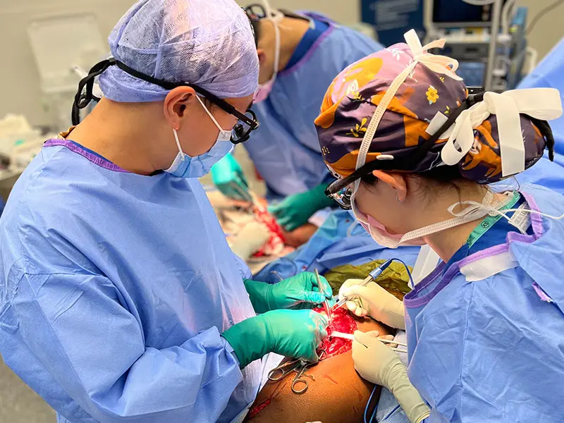 Fellows from the Hand and Upper Extremity Fellowship Program at Mount Sinai perform anterolateral thigh flap surgery for hand-wound reconstruction with Dr. Kim.