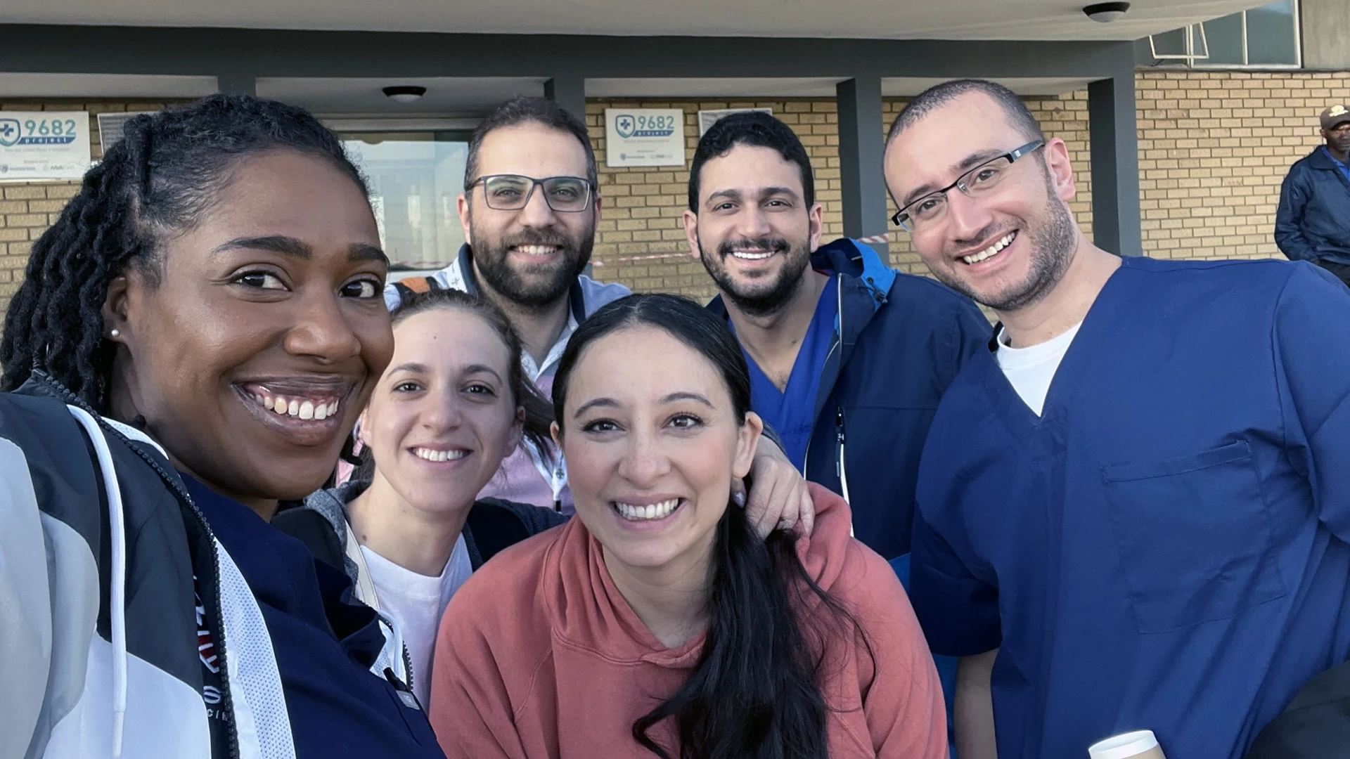 Dr. Zakhary (center) and Dr. Louissaint (left) also worked with clinicians in other specialties around the world during the trip, including a physical therapist, primary care sports doctor, plastic surgeon, and an anesthesiologist.