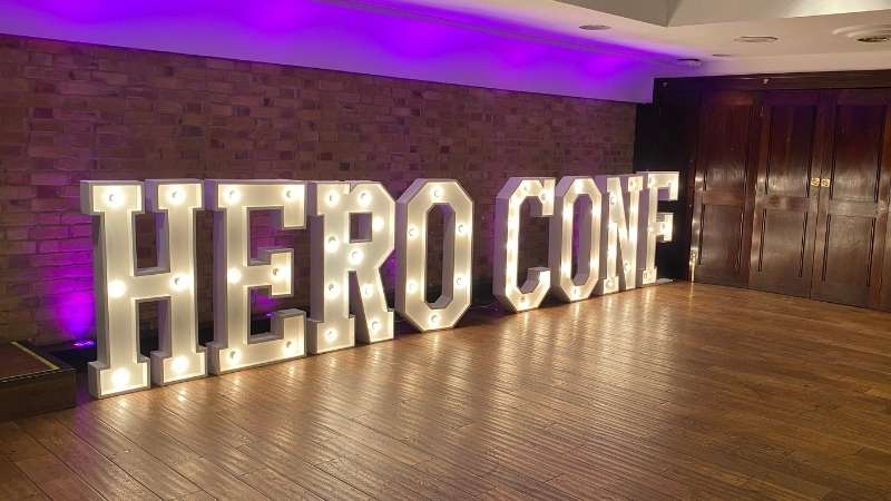 Hero Conf spelled in light-up letters