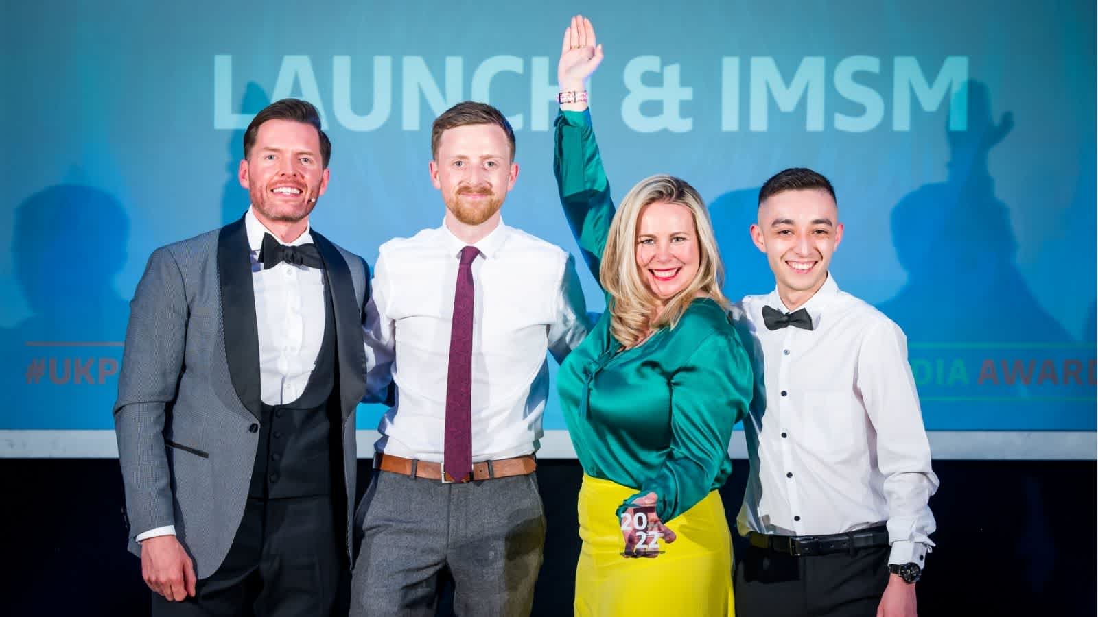 Launch team celebrating at the UK Paid Media Awards