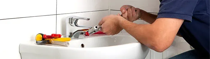 plumber fixed a bathroom sink