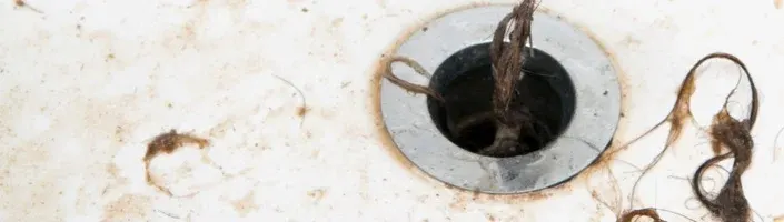 hair clogging a bathroom drain