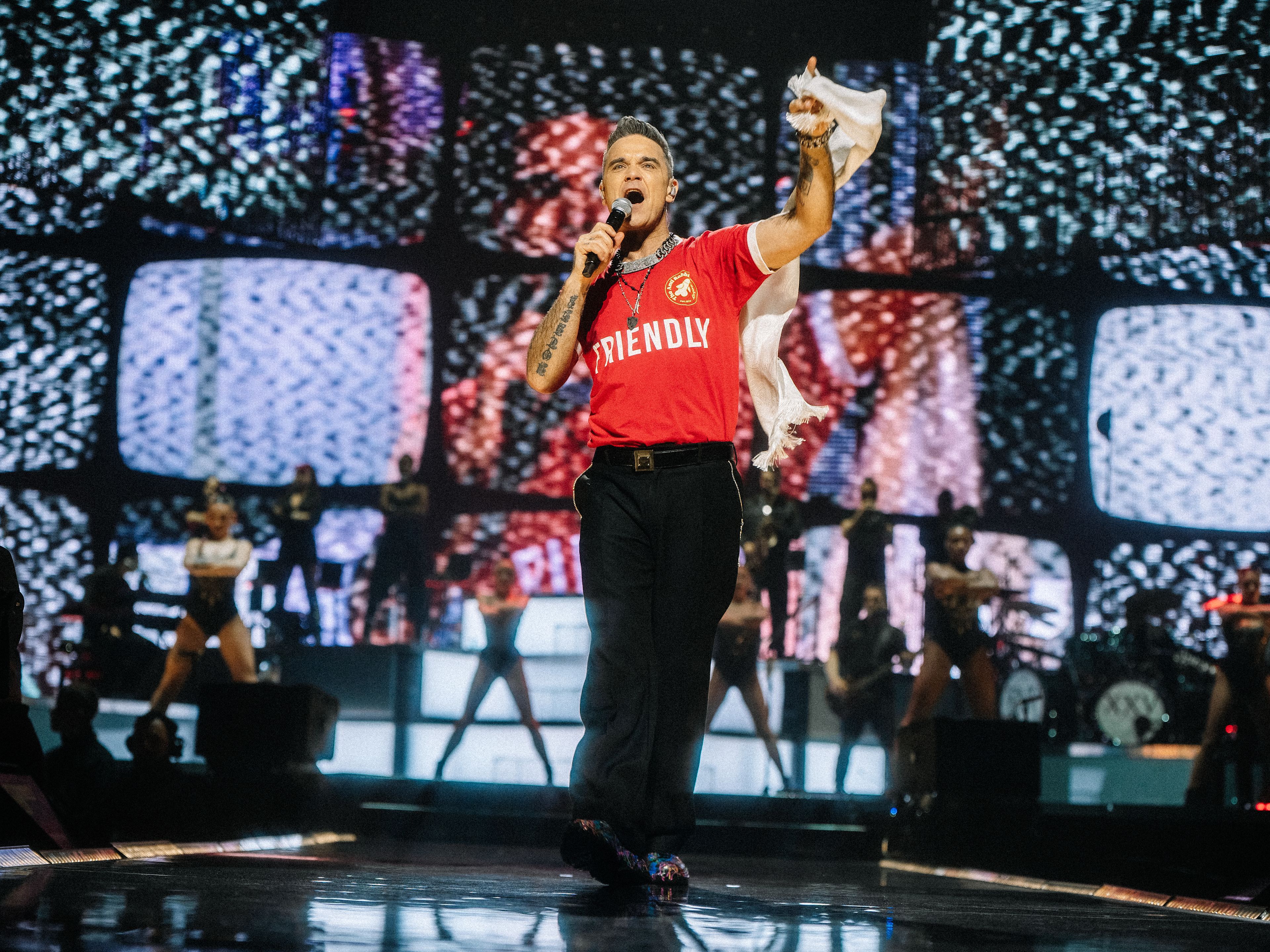 Robbie Williams auf Bühne Robbie Williams auf Bühne