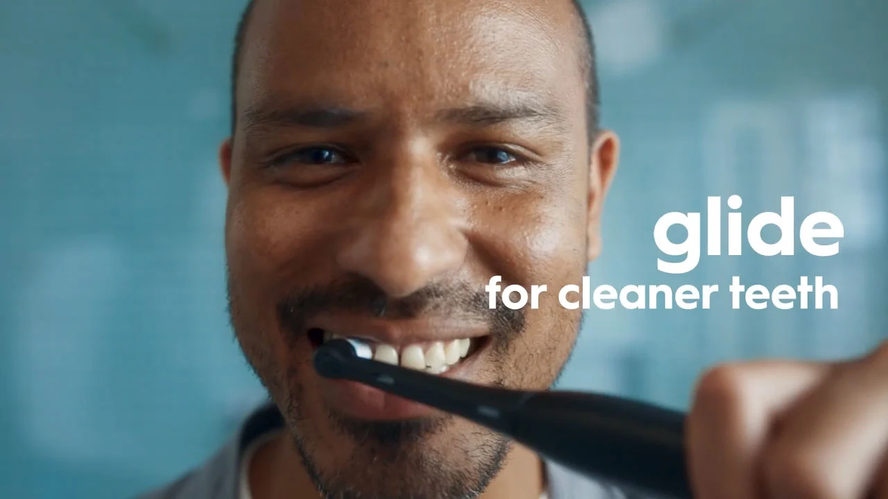 Glide Don't Scrub with an Electric Toothbrush 