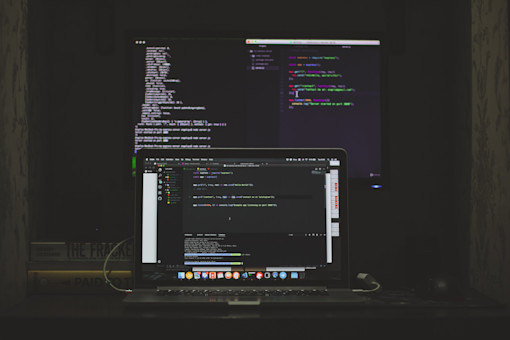 Laptop and monitor with code