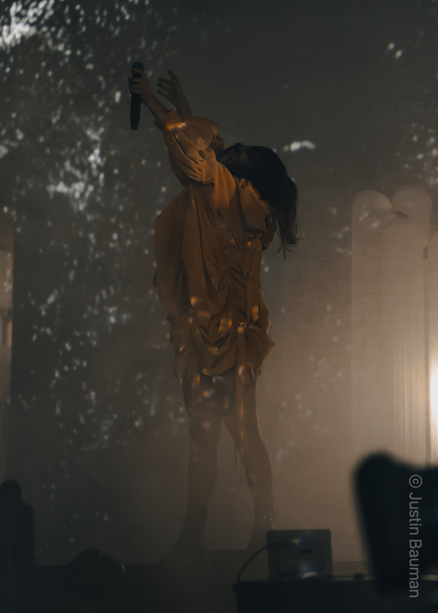 Singer from Purity Ring reaching up. From Life Is Beautiful 2021.