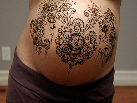Young Pregnant Woman With Henna Tattoo On Belly In Park Stock Photo  Picture And Royalty Free Image Image 108012124